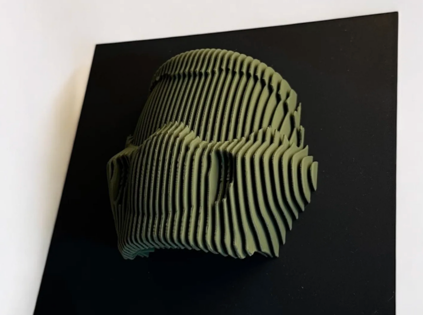 Layered sculpture of iconic Figures. Collect all of them to make stunning wall or desk display.