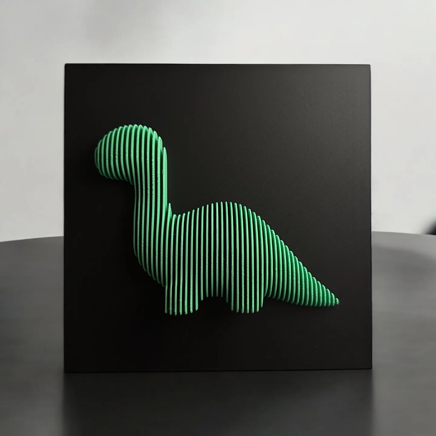 Layered sculpture of iconic Figures. Collect all of them to make stunning wall or desk display.