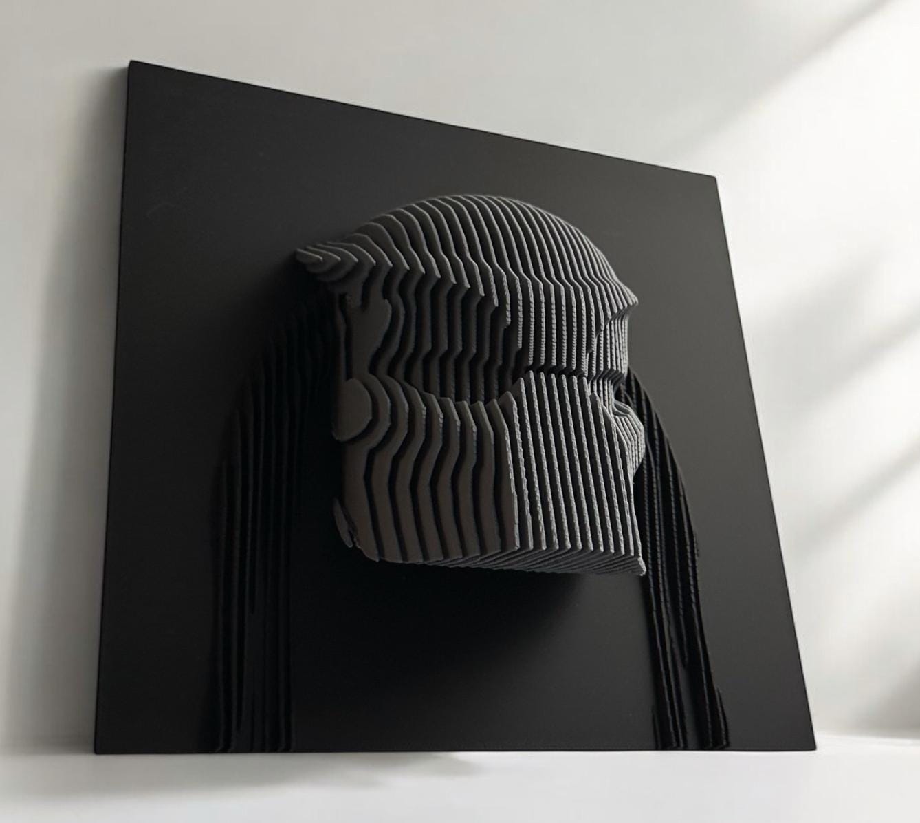 Layered sculpture of iconic Figures. Collect all of them to make stunning wall or desk display.