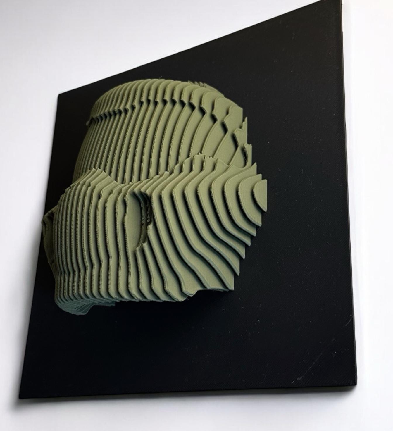 Layered sculpture of iconic Figures. Collect all of them to make stunning wall or desk display.