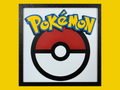 Pokémon logo with Pokéball layered 3D printed Hueforge wall art panel