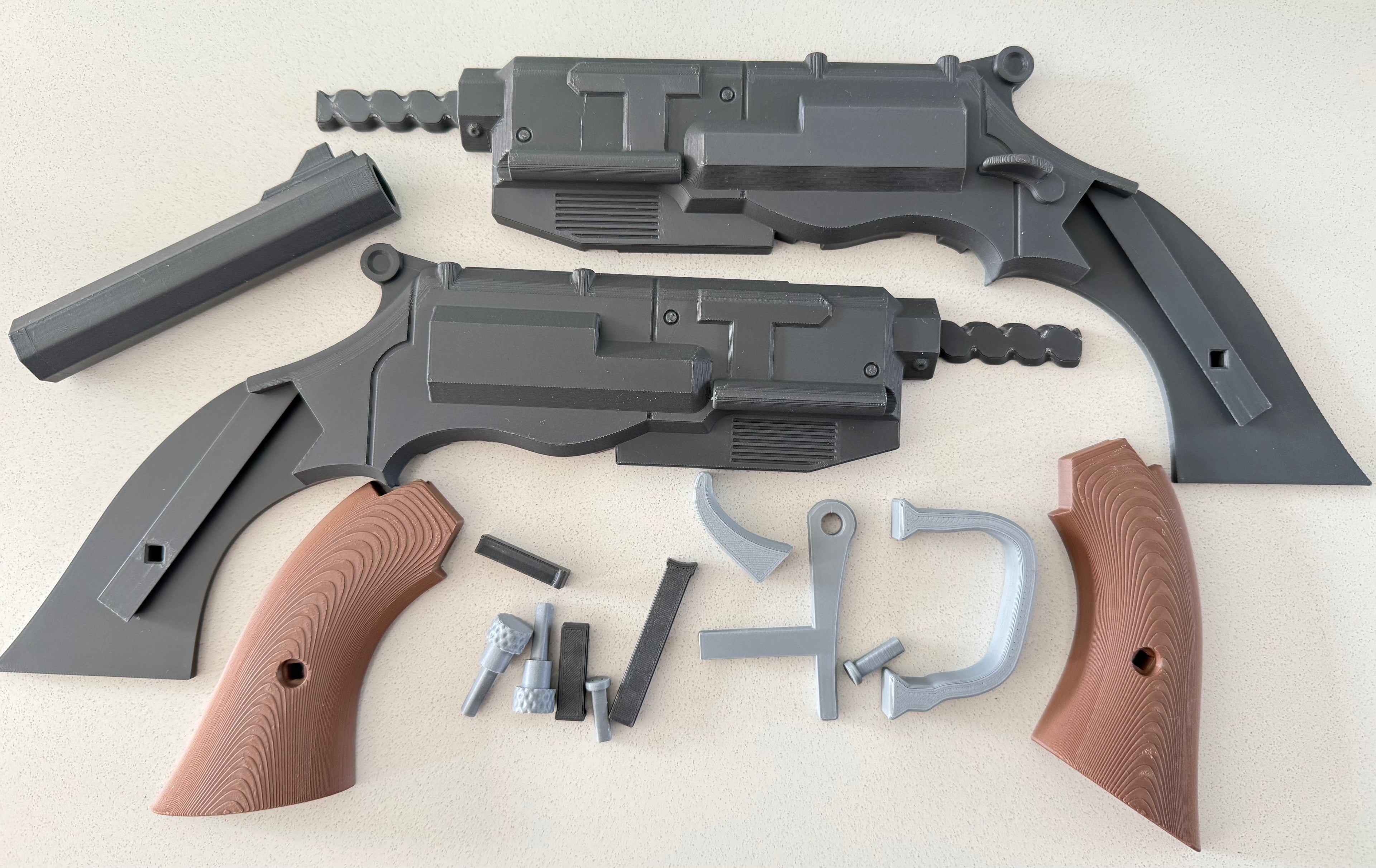 Serenity Mal Reynolds Pistol model kit laid out in parts