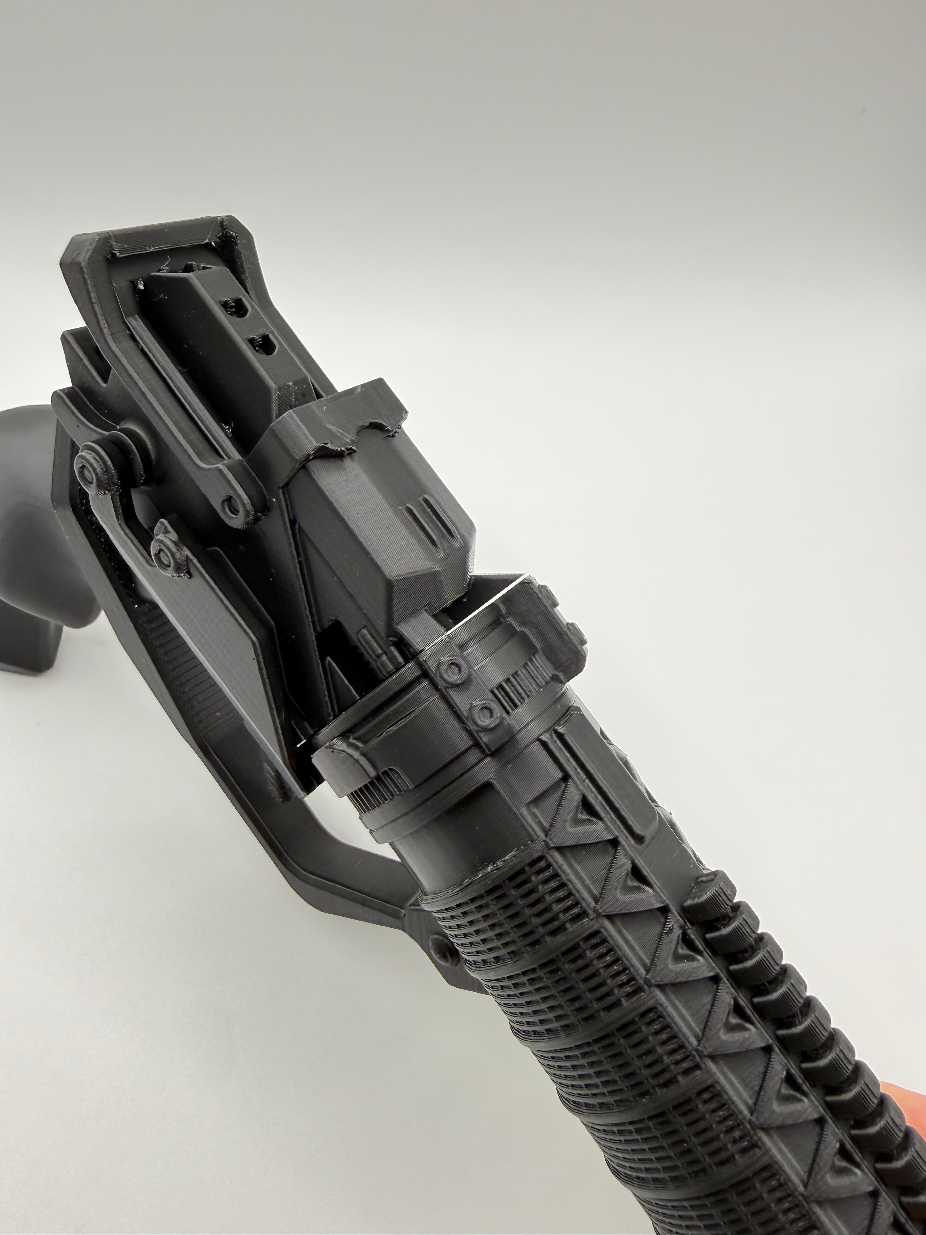 Close-up of the printed K's Blaster receiver and rear sight before final assembly