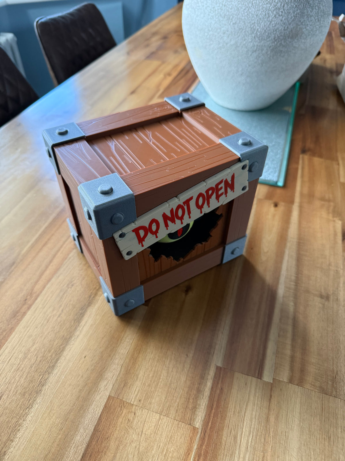 Spooky Halloween box lit up with LED candles glowing