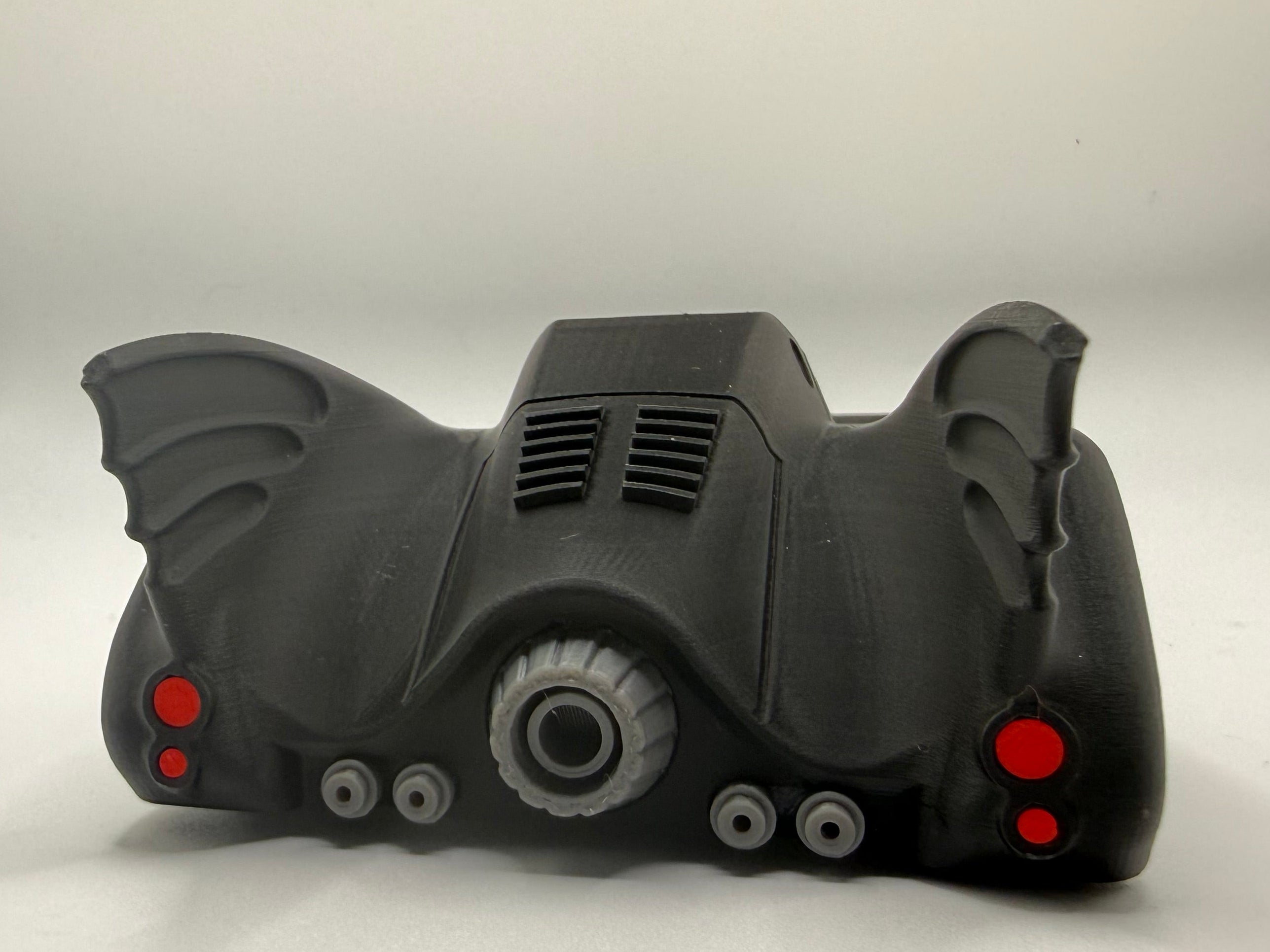 Batmobile 1989 model kit design on a white background