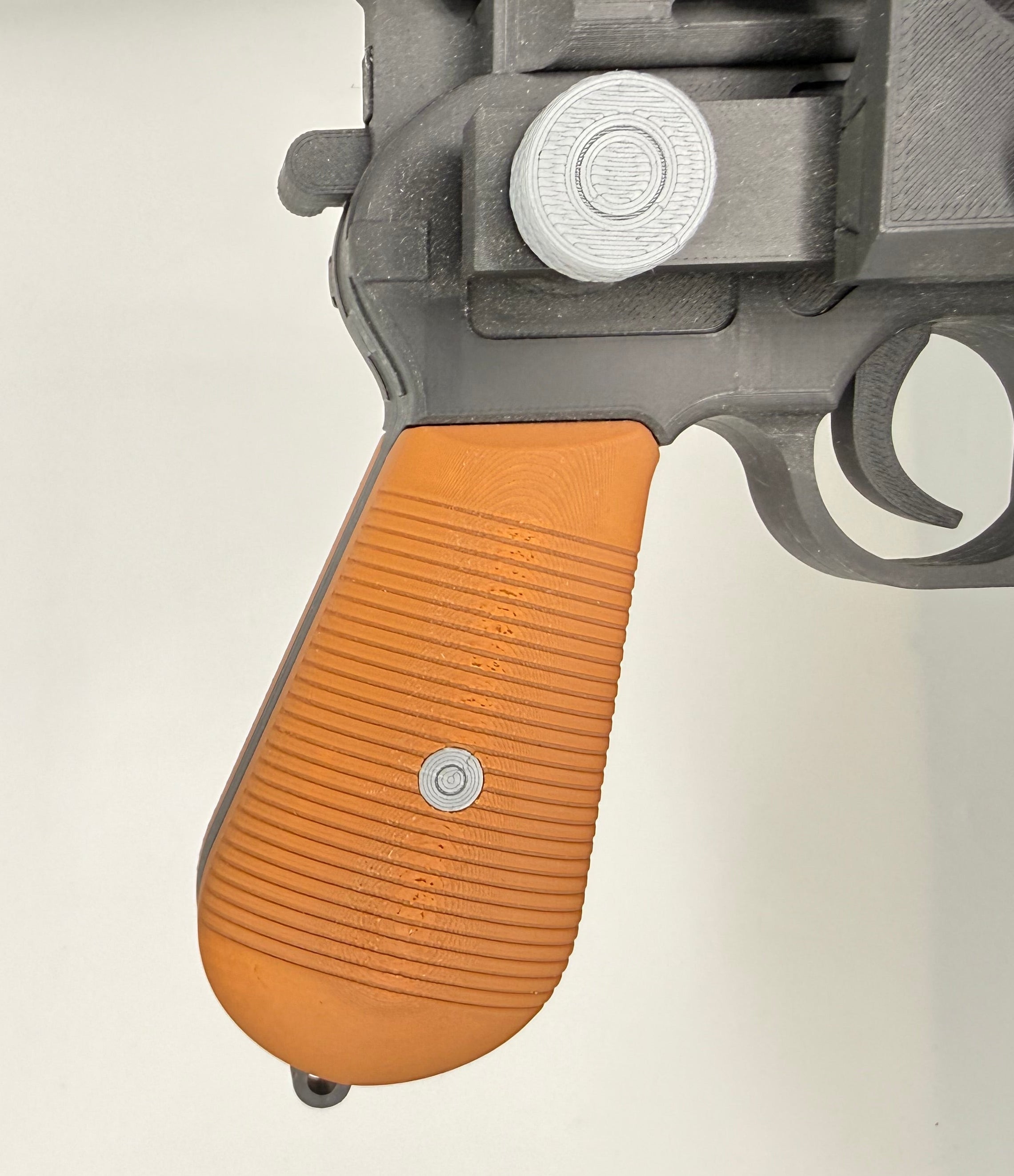 DL-44 Close-up of a gun with a brown grip on a white background 3dcre8design