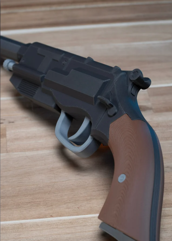 Mal Reynolds' Firefly pistol prop kit, close-up of hammer, trigger and wood-effect grip