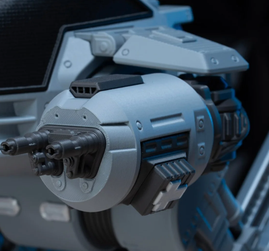 Close-up of the ED-209 kit's twin chin cannons and shoulder housing detail