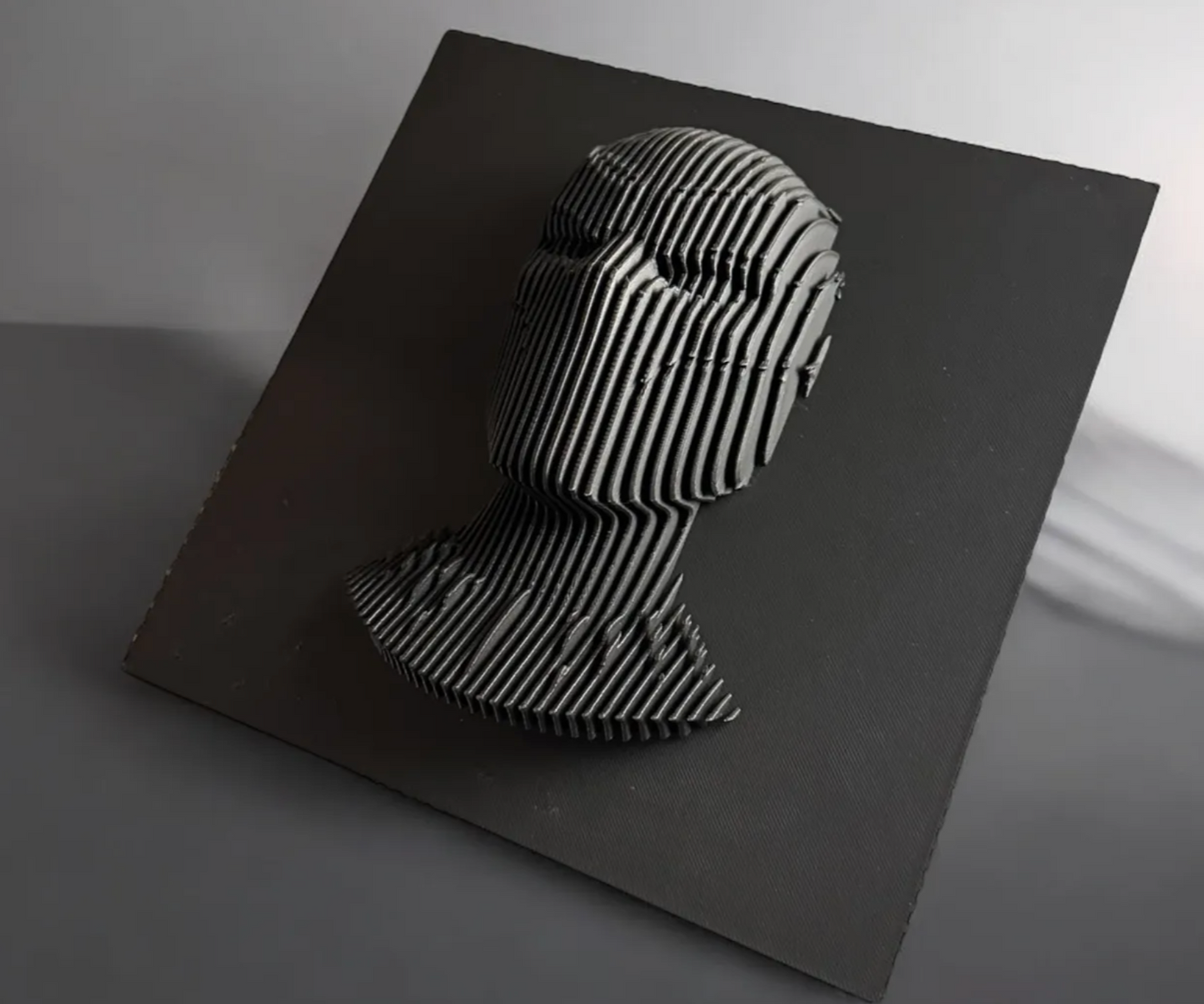 Layered sculpture of iconic  Figures. Collect all of them to make stunning wall or desk display.