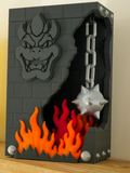 Broken Brick Bowser diorama, Decorative version, angled front view showing Bowser emblem, flames and spiked wrecking ball