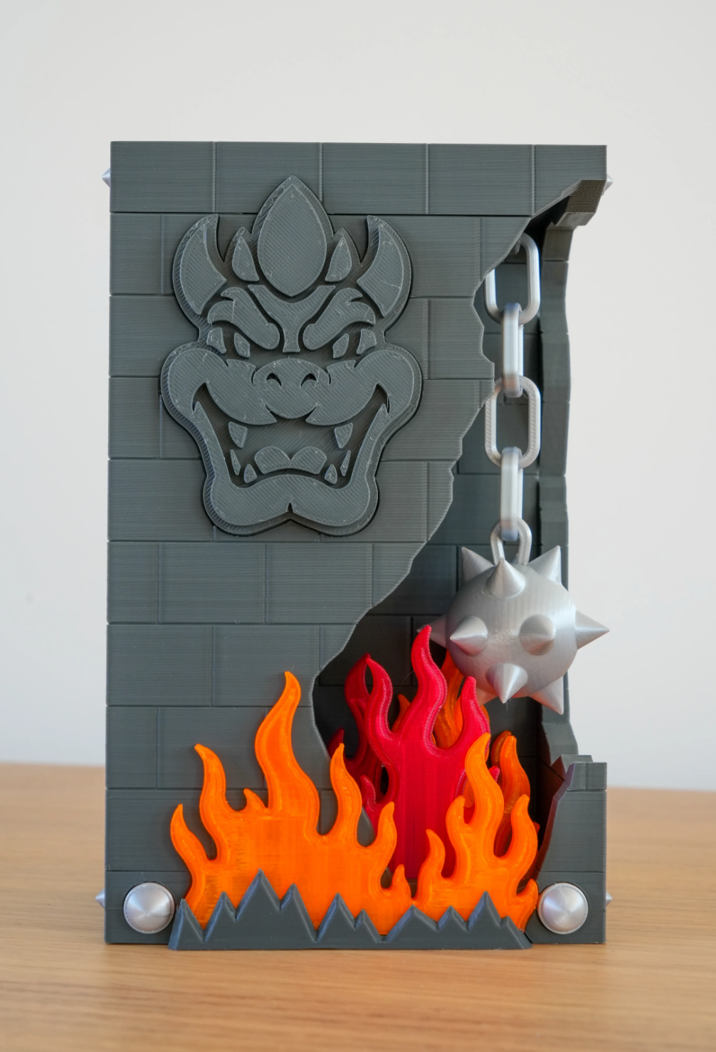 Broken Brick Bowser diorama, Decorative version, straight-on front view with Bowser emblem and flames
